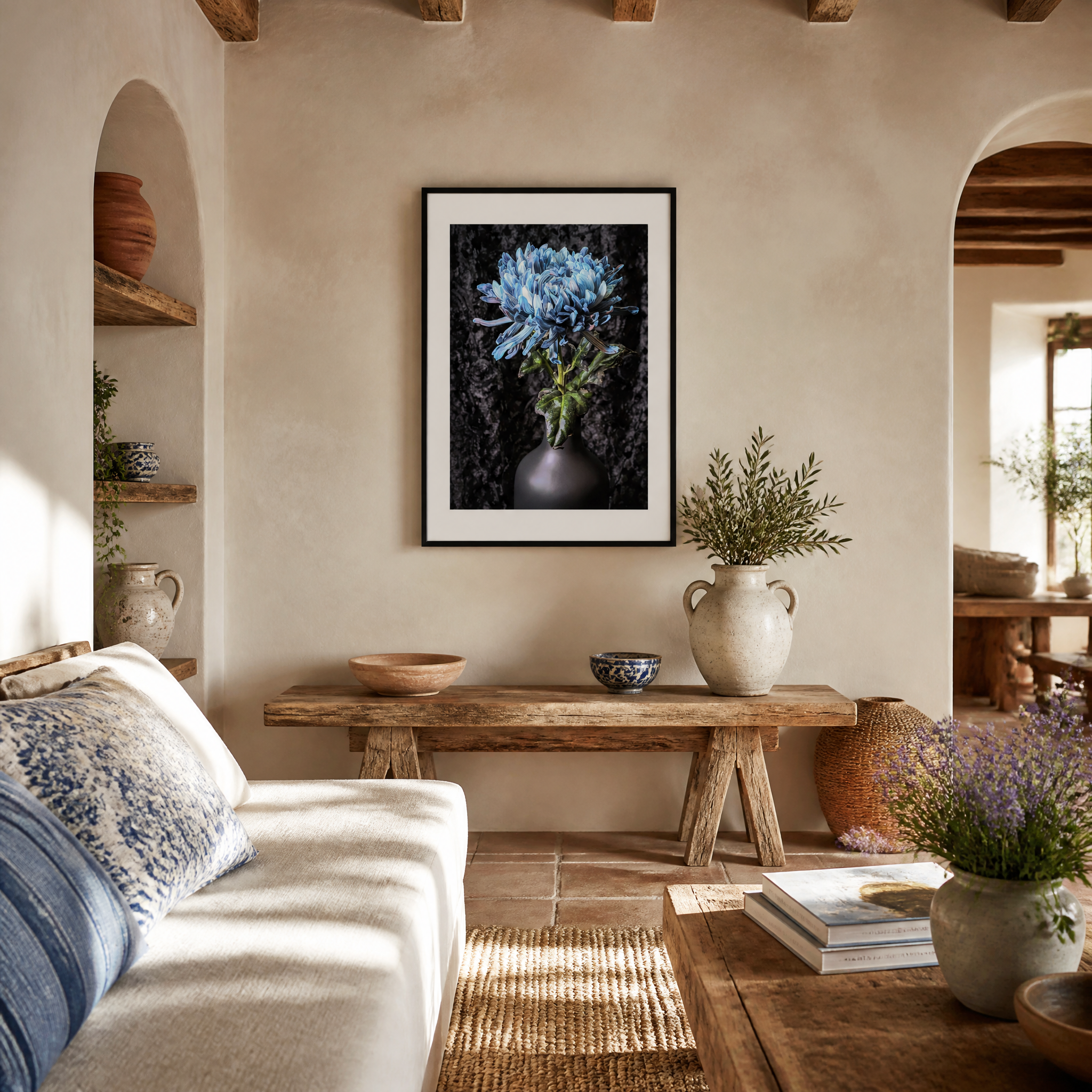 Living room with a sofa, coffee table, and wall art featuring a blue flower. Blue Chrysanthemum ~ Fine Art Photography by Ivo Titzin ~ Limited Edittion Wall Decor by Gito Art