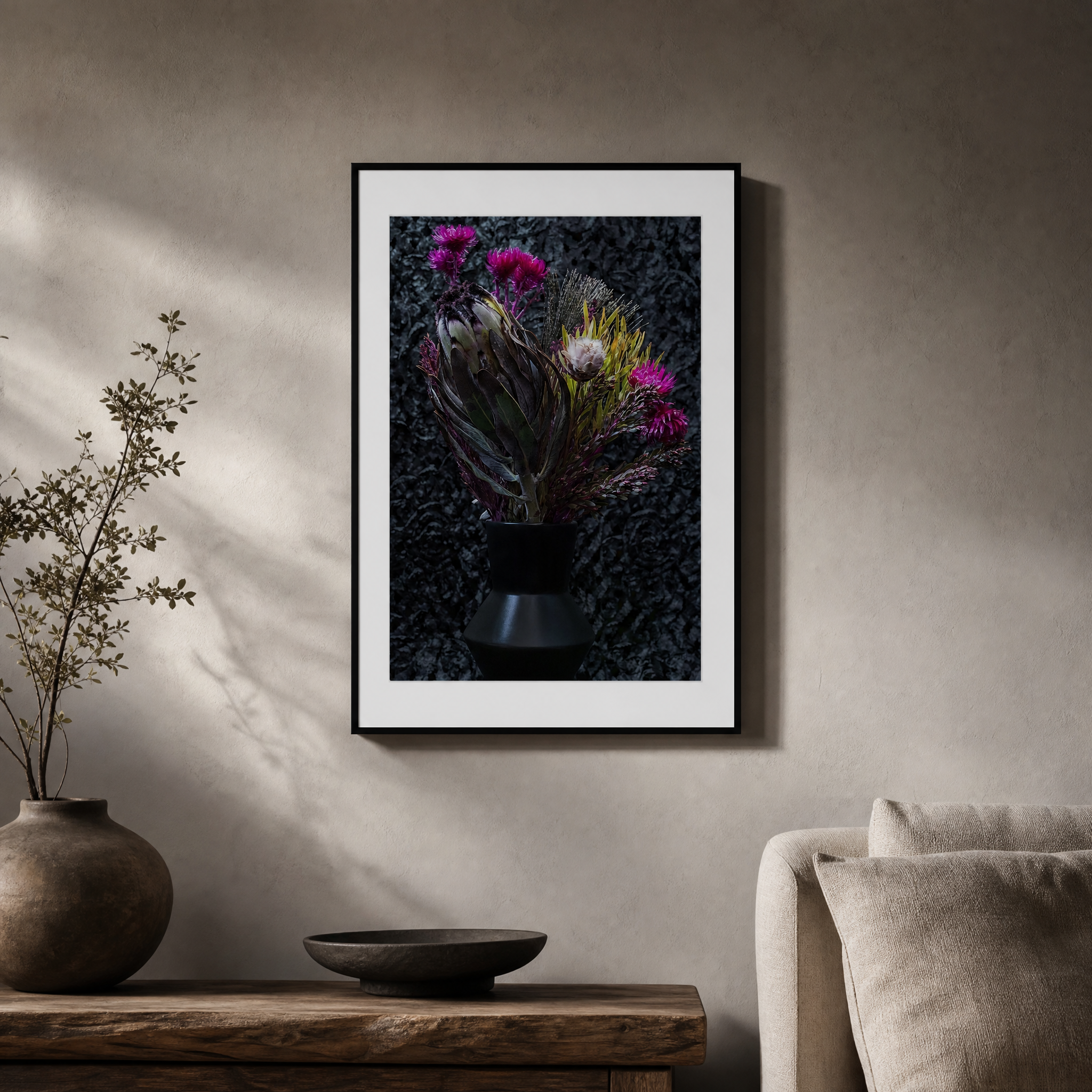 Framed floral artwork on a wall above a wooden console table with decorative items. ~ Fine Art Photography by Ivo Titzin ~ Luxury Wall Art by Gito Art