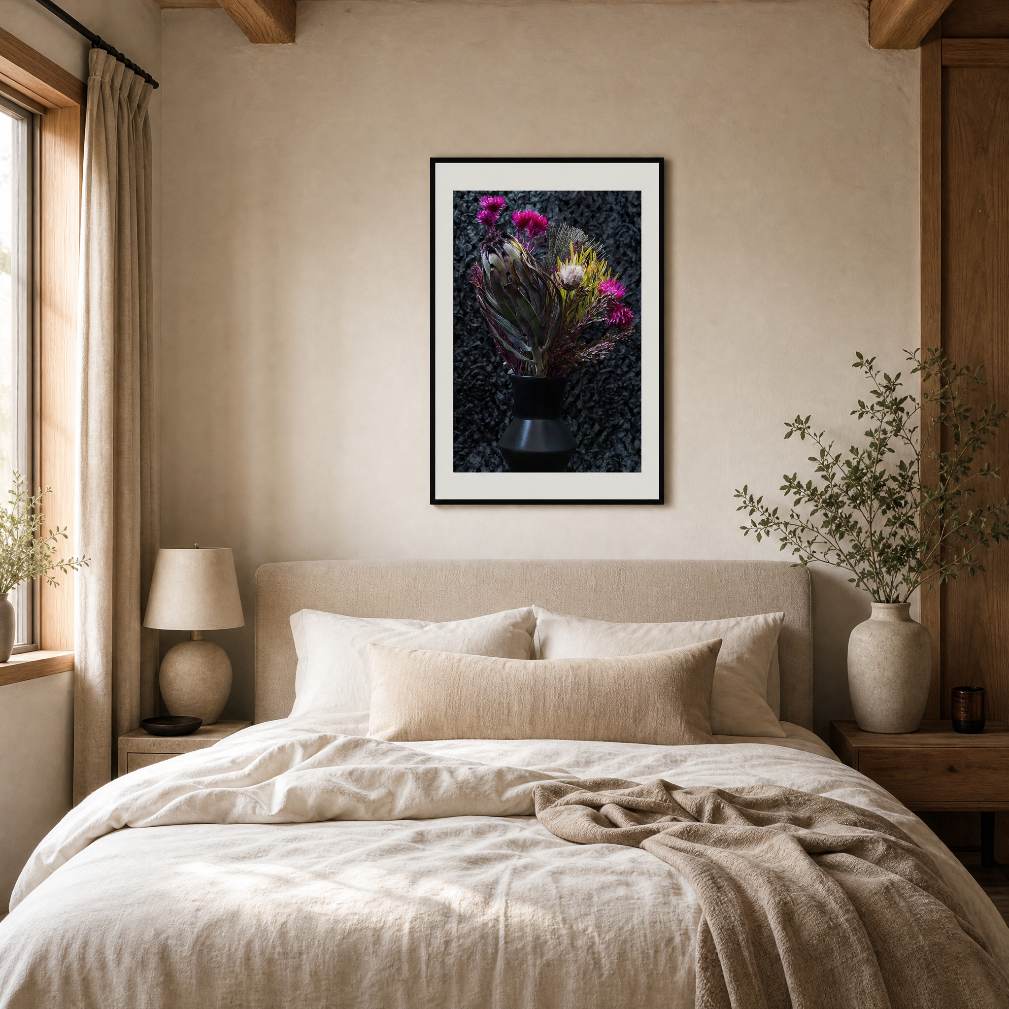 Neatly made bed in a bedroom with a framed floral picture on the wall. ~ Fine Art Photography by Ivo Titzin ~ Luxury Wall Art by Gito Art  