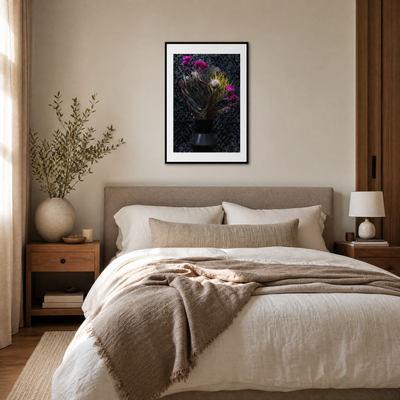 Neatly made bed in a bedroom with a framed picture on the wall, side tables, and decorative items. ~ Fine Art Photography by Ivo Titzin ~ Luxury Wall Art by Gito Art  