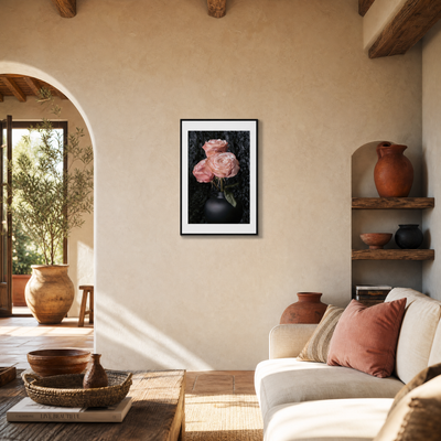 Living room with a framed picture of pink roses on the wall, a couch with pillows, and decorative vases. ~ Hybrid Tea Rose ~ Fine Art Photography by Ivo Titzin ~ Limited edittion Luxury Wall Art by Gito 