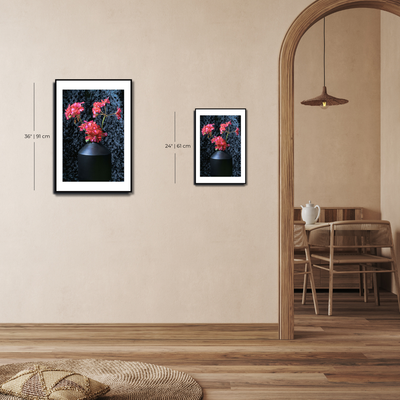 Two framed pictures of flowers on a wall with a dining area in the  ~ Fine Art Photography by Ivo Titzin ~ Black Series ~ Limited edittion Wall Art by Gitobackground.