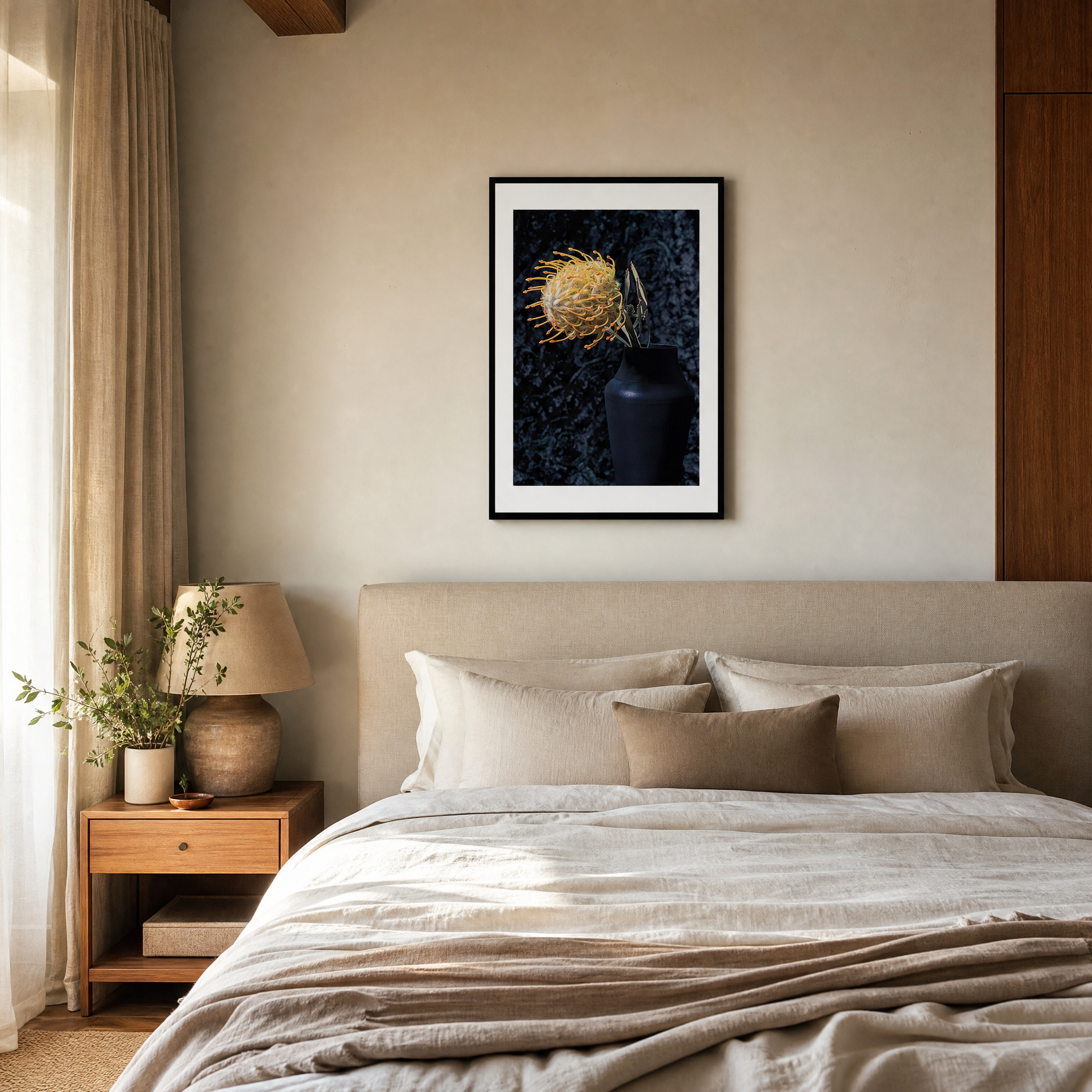 Neatly made bed in a bedroom with a framed artwork on the wall. ~ Pincushion Protea ~ Fine Art Photography by Ivo Titzin ~ Luxury Wall Art by Gito ~ Limited edition