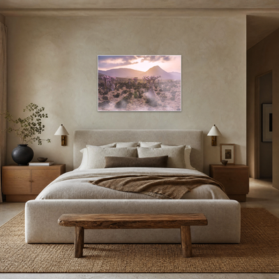 Gito.Art - Exclusive Art Print - Photography by Delyan Markov
A framed landscape art print depicting a desert mountain scene at sunset, displayed on a beige wall above a bed in a modern, neutral-toned bedroom.
