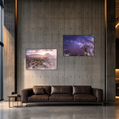 Gito.Art - Exclusive Art Print - Photography by Delyan Markov
Two framed landscape art prints displayed on a concrete wall above a dark brown leather sofa in a modern interior setting.