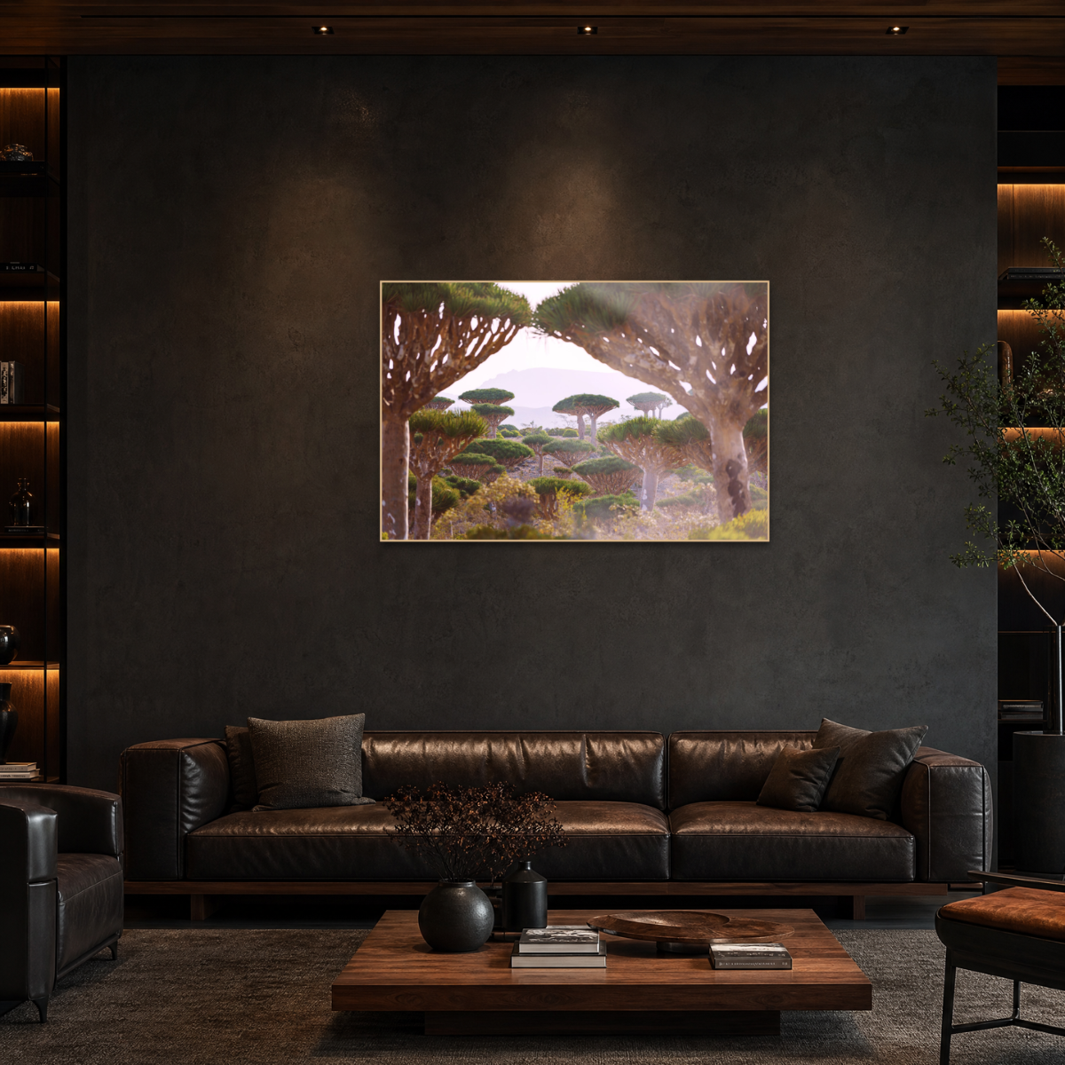 Gito.Art - Exclusive Art Print - Photography by Delyan Markov
A framed landscape art print depicting a scenic Tuscan landscape with distinctive arched trees, displayed on a dark textured wall above a brown leather sofa in a modern living room setting.