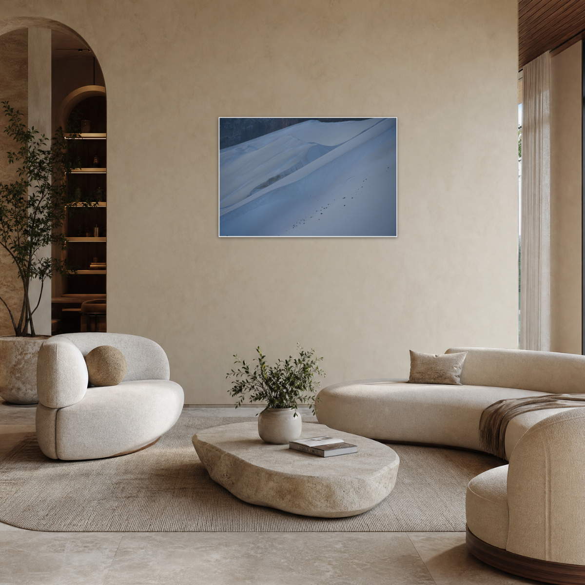Gito.Art - Exclusive Art Print - Photography by Delyan Markov
A framed landscape art print depicting blue sand dunes, displayed on a textured beige wall in a modern, minimalist living room with cream-colored furniture.