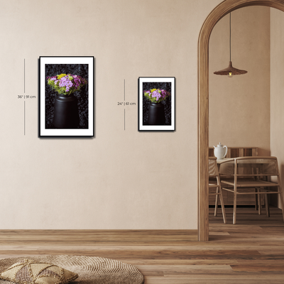 Two framed pictures of flowers on a wall with a dining area in the  ~ Fine Art Photography by Ivo Titzin ~ Gito Limited Wall Art background.