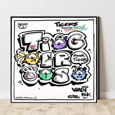 Gito Fine Art Print - Art Vladi Vl Comics - Tigers
A framed black-and-white comic-style poster with colorful cartoon tiger faces and graffiti lettering, leaning against a light wall on a wood floor.