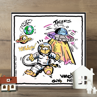 Gito Fine Art Print - Art Vladi Vl Comics - Tigers
A square framed art print featuring a cartoon astronaut tiger, a UFO, planets, and playful text, displayed on a wooden surface with small decorative houses in the foreground.